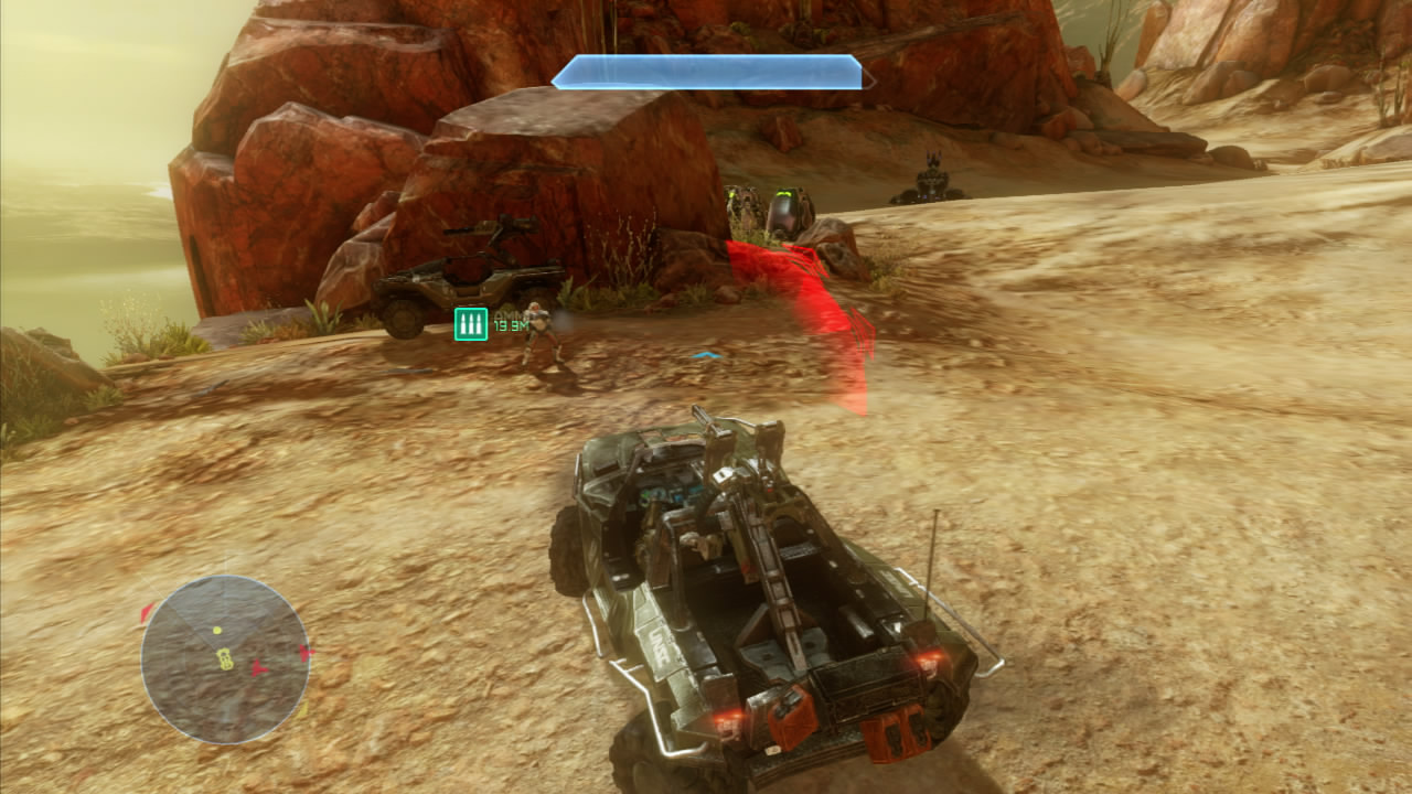 This will cause a few phantoms to spawn around the corner to the right which will come and drop off a wraith and four ghosts. Destroy these enemy vehicles and then proceed up the slope just to the right of the mammoth (you will see a covenant ship with a green beam at the top of the hill). On the way up you will have to take down a couple of elites and a small group of grunts and jackals.